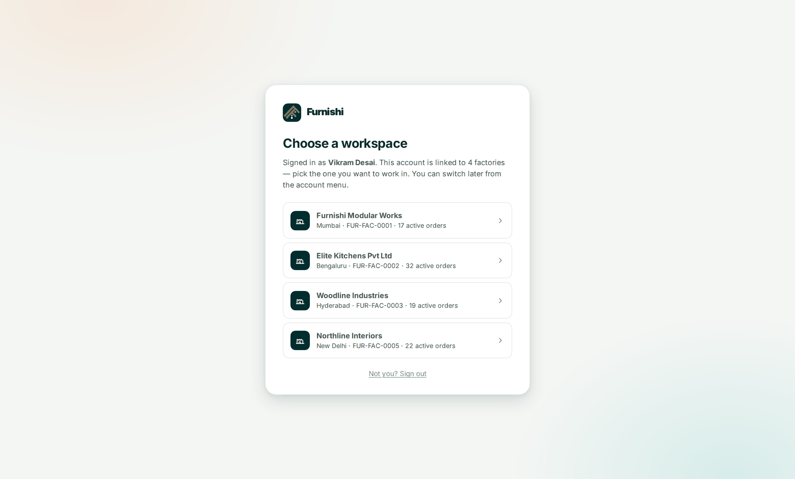 The workspace picker — shown only to an account linked to more than one factory, and only after sign-in.